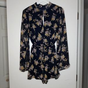 Black and floral romper